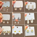 Silver Needle Korean Geometric Pearl Earrings Luxury Butterfly Flower Vintage Pearl Stud Earrings view 1