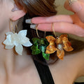 Hong Kong Style Vintage Resin Flower Hoop Earrings With Silver Pins, Elegant Niche Floral Design view 4
