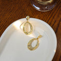 Elegant Gold Alloy Wrinkled Geometric Oval Hoop Dangle Studs Minimalist Metal Texture Earrings view 3