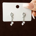 Light Luxury Rhinestone Teardrop Pearl Tassel Chain Drop Clip Stud Earrings view 4