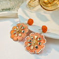 Bohemian Round Raffia Woven Flower Drop Earrings With Gold Alloy Petal Charm Vacation Statement Earrings view 3