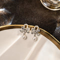 Elegant Korean Silver Tone Alloy Rhinestone Bowknot With Faux Pearl Drop Dangle Stud Earrings view 4