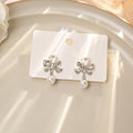 Elegant Korean Silver Tone Alloy Rhinestone Bowknot With Faux Pearl Drop Dangle Stud Earrings view 1