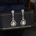 Elegant Silver Needle Rhinestone Oval Studs With Hollow Teardrop Crystal Pendant Luxury Earrings view 2