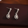 Elegant Silver Needle Rhinestone Oval Studs With Hollow Teardrop Crystal Pendant Luxury Earrings view 4