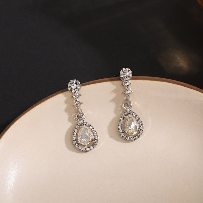 Elegant Silver Needle Rhinestone Oval Studs With Hollow Teardrop Crystal Pendant Luxury Earrings