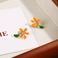 Elegant Orange Enamel Flower Zircon Leaf Stud Earrings For Women Summer Fresh Forest Style Earrings view 3