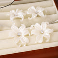Luxury White Pearl Acrylic Iris Flower Zircon Center Statement Stud Earrings view 2