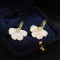Elegant White Enamel Flower Petal Gold Alloy Rhinestone Center Sweet Light Luxury Clip Earrings view 3