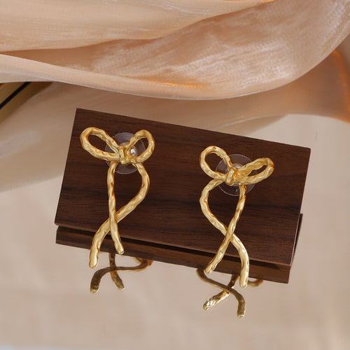 Elegant Korean Minimalist Alloy Metal Ribbon Bow Stud Earrings For Women Niche Design Wire Bowknot Earrings