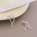 Elegant Korean Minimalist Alloy Metal Ribbon Bow Stud Earrings For Women Niche Design Wire Bowknot Earrings view 3