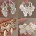 French Chic Faux Pearl Flower Tassel Drop Earrings With Silver Needle Posts view 1