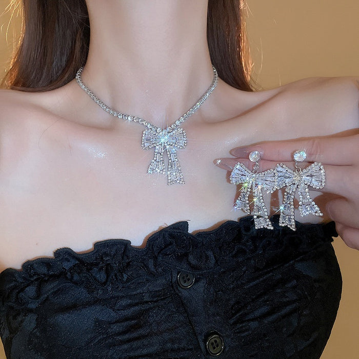 Light Luxury Copper Bow Trapezoid Zircon Drop Earrings With Silver Pins