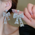 Light Luxury Copper Bow Trapezoid Zircon Drop Earrings With Silver Pins view 3