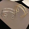 Irregular Minimalist Line Wrap Metal Open Bangle Designer Fashion Arm Cuff 2026 view 4