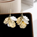 Light Luxury French Vintage White Shell Petal Flower Gold Alloy Silver Needle Dangle Drop Earrings view 4