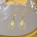 Luxury Geometric Oval Rhinestone Tassel Drop Alloy Hook Earrings For Women Elegant Vintage Earrings view 2