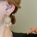 Bohemian Alloy Pearl Tassel Drop Earrings With Vintage Ethnic Geometric Round Design view 3