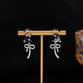 Elegant Women's Asymmetric Gradient Moon Star Rhinestone Alloy Bowknot Drop Stud Earrings view 4
