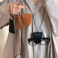 Women's Faux Leather Black Key Pouch Sunglasses Clip Sweater Necklace With Unique Geometric Design view 1
