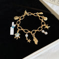 Fresh Ocean Pearl Alloy Bangle With Goldfish Conch And Starfish Summer Vacation Style view 3