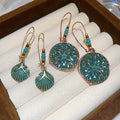 Bohemian Alloy Hollow Flower Starfish Drop Earrings, Natural Ethnic Style Statement Jewelry view 1