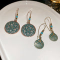 Bohemian Alloy Hollow Flower Starfish Drop Earrings, Natural Ethnic Style Statement Jewelry view 3
