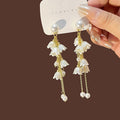2025 Korean Pearl Geometric Flower Tassel Bow Stud Earrings For Women Elegant Fashion Jewelry view 3