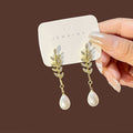 2025 Korean Pearl Geometric Flower Tassel Bow Stud Earrings For Women Elegant Fashion Jewelry view 2