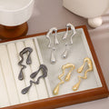 Elegant Irregular Water Drop Abstract Alloy Stud Earrings For Women Minimalist Statement Metal Earrings view 1