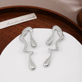 Elegant Irregular Water Drop Abstract Alloy Stud Earrings For Women Minimalist Statement Metal Earrings view 4