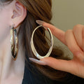 Chic Copper Oval Hoop Earrings With Silver Pins Geometric Line Statement Design view 4
