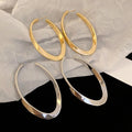 Chic Copper Oval Hoop Earrings With Silver Pins Geometric Line Statement Design view 3