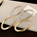 Chic Copper Oval Hoop Earrings With Silver Pins Geometric Line Statement Design view 1