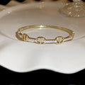 Gold Plated Copper Oval Bangle With Sparkling Zircon Luxury Fashion Statement Jewelry view 2