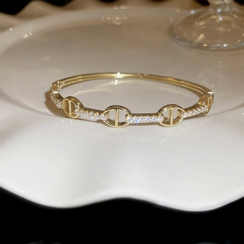 Gold Plated Copper Oval Bangle With Sparkling Zircon Luxury Fashion Statement Jewelry