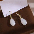 Vintage Chinese Style Luxury Rhinestone Inlaid Gold Alloy White Teardrop Dangle Qipao Earrings view 2