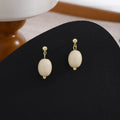 Elegant Vintage Milk White Oval Acrylic Bead Gold Alloy Geometric Drop Stud Earrings view 4