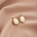 Elegant Vintage Milk White Oval Acrylic Bead Gold Alloy Geometric Drop Stud Earrings view 2