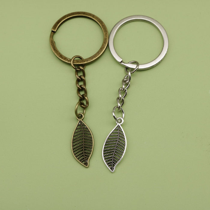 Zinc Alloy Leaf Keychain Bag Charm Gift (5865)