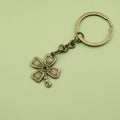 Zinc Alloy Minimalist Four Leaf Clover Keychain Bag Charm view 6
