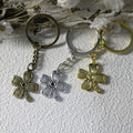 Zinc Alloy Minimalist Four Leaf Clover Keychain Bag Charm view 3