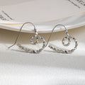 Korean Light Luxury Alloy Hollow Heart Spiral Hoop Earrings For Women Minimalist Faceted Ripple Earrings view 3