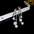 French Chic Star Meteor Drop Earrings With Faux Pearl Rhinestone Silver Needle Long Tassel Design view 3