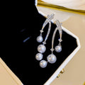 French Chic Star Meteor Drop Earrings With Faux Pearl Rhinestone Silver Needle Long Tassel Design view 1