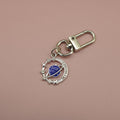 Zinc Alloy Star Moon Planet Knot Keychain Bag Charm Gift view 1