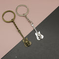 Metal Skull Guitar Keychain Bag Charm view 1