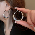 Chic Alloy Twisted Rhinestone Hoop Earrings With Silver Needle Geometric Statement Design view 3