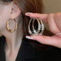 Chic Alloy Twisted Rhinestone Hoop Earrings With Silver Needle Geometric Statement Design view 1