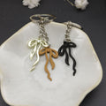 Zinc Alloy Geometric Bow Keychain Bag Charm Gift view 4